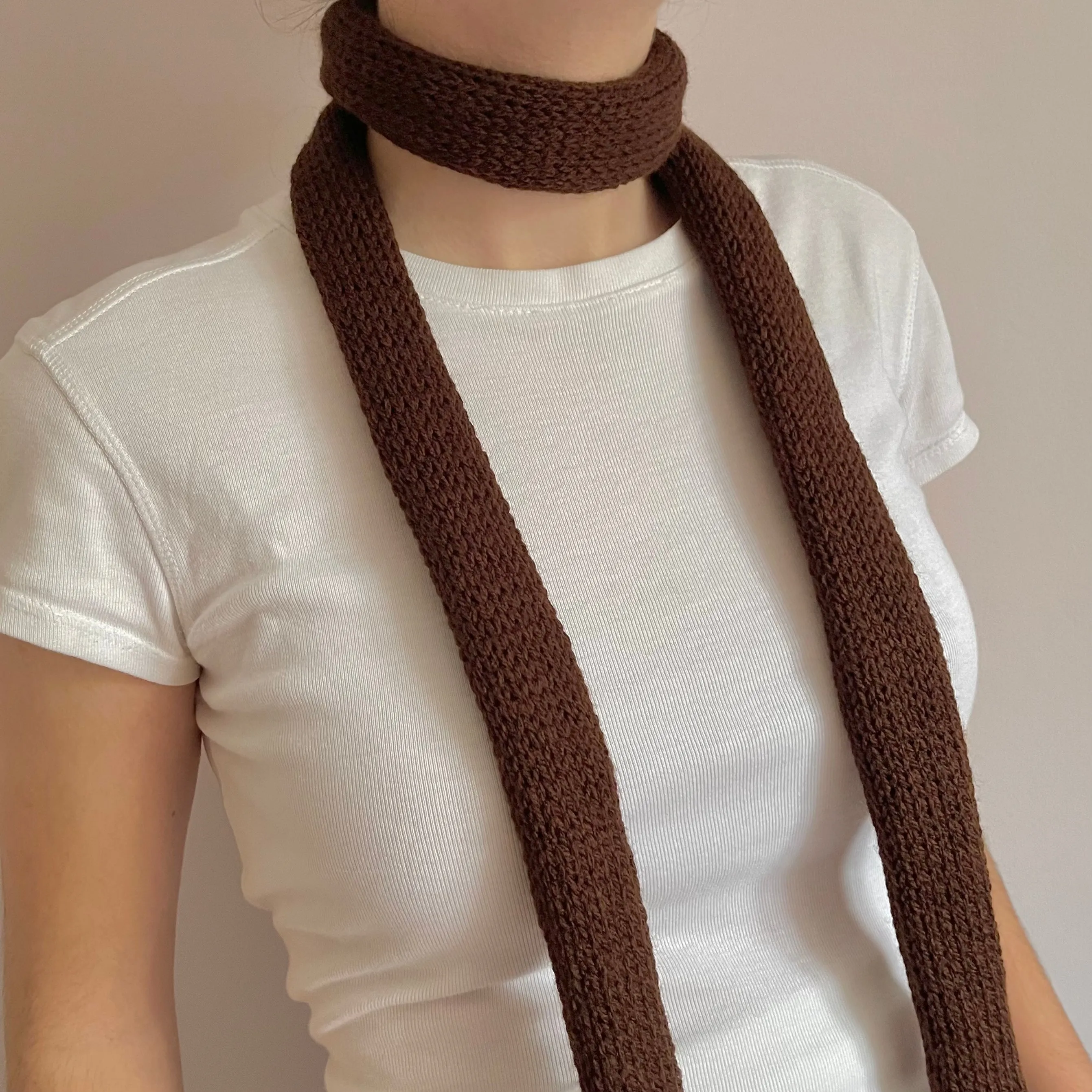 Handmade knitted skinny scarf in brown